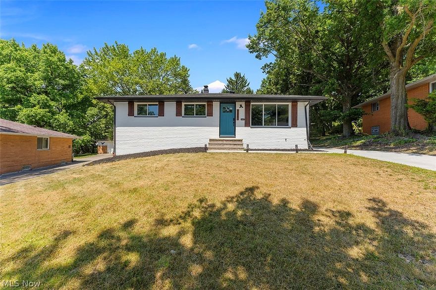 This gorgeously renovated ranch is a rare find! Completely redone w/ expert taste & skill, the home is brand new everything inside & out! Updates include full exterior paint, new roof, new A/C, new hot water tank & more! First fall in love w/ the stylish white exterior & bright front door! Then step through the front door to find a large welcoming living room w/ custom LVP flooring that continues throughout the home & a beautiful custom gas fireplace focal wall. French doors open to the custom designed kitchen w/ tons of storage in the modern white cabinetry lining the room, chic tile backsplash in swirling blues & creams, dining area w/ built-in bench overlooking the scenic backyard & of course all new stainless steel appliances! The main floor also offers 3 bedrooms, including a master bedroom w/ access to a convenient half bath & gorgeous full bath w/ vanity, distinctive tile floors & striking black & white tile tub surround! Downstairs the basement offers even more living space w/