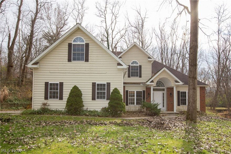 Prepare to be Moved!...into this stunning Olmsted Cape set on 2+ scenic & secluded acres complete with tranquil creek views.  Totally updated, tastefully decorated and ready to move right in!  Tiled foyer leads to the 2-story Great Room with dual-sided stone fireplace plus slider door to patio & arched window to soak in the gorgeous scenery.  The eat-in kitchen shares the warmth & ambiance of the fireplace & includes abundant cabinets, granite counters, SS appliances as well as a 2nd slider door to the patio.  Just off the foyer is the richly detailed formal dining room with trayed ceiling, crown molding & wide plank hardwood floor.  1st floor Master with cozy fireplace, in-suite bath with garden tub plus shower & dual-sink vanity.  Half-bath & large laundry/mud room complete the level.  The second level boasts three generously-sized bedrooms (including one possible alternate and/or 2nd Master BR) & two additional bathrooms.  As beautiful as the interior is, equally impressive is the b