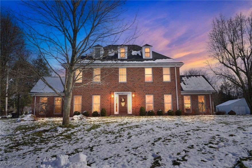 Welcome to this Kelly Park Estate! Discover timeless elegance and modern comfort in this impressive three-story colonial brick home offering more than 2,517 sq ft of finished living space, a full basement, and a BRAND NEW ROOF (Nov 2025). Nestled on 1.19 beautifully landscaped acres, this property provides all the space, style, and functionality you’ve been searching for.

Step inside the grand foyer to find a sweeping staircase, natural hardwood trim, and period charm seamlessly balanced with fresh modern design. The home features 3 bedrooms and 3.5 bathrooms, including:

• Third-floor bedroom with expansive closets
• Second-floor primary suite with ensuite bathroom
• Additional second-floor bedroom with large closets

The beautifully remodeled kitchen (2020) showcases new cabinetry, granite countertops, tile flooring, stylish backsplash, and modern appliances. The adjacent living room with fireplace, spacious family room, elegant dining room with fireplace, dedicated office, and a brick-lined bonus room offer endless layout flexibility for work, entertaining, or leisure.

Outdoor amenities elevate this property into a true retreat. Enjoy the covered patio with full outdoor kitchen and fireplace, a fenced 32' x 16' inground pool with a new liner (2019) and pool pump (2025), plus a covered terrace perfect for relaxing or entertaining. A detached 32' x 24' pole barn provides additional parking, workshop space, or storage.

Recent upgrades include a 2025 water softener system and fresh interior paint, ensuring a move-in-ready experience.

Located moments from The Links at Firestone, Pine Lake, Evans Lake, Mill Creek Wildlife Sanctuary, Reserve Run Golf Course, Mill Creek Preserve, and the Leetonia Beehive Coke Ovens Park, this home offers unmatched access to outdoor recreation and natural beauty. A rare blend of historic charm, modern upgrades, generous living space, and stunning outdoor amenities. Schedule your private showing today!