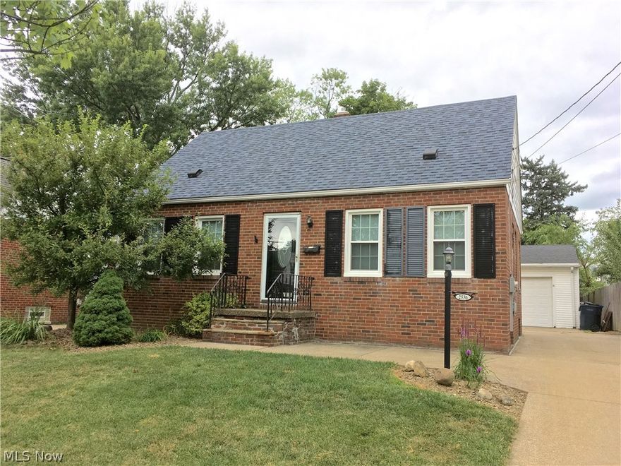 Solid brick cape in great location in the Falls.  Beautiful hardwood floors, remodeled bathroom, new furnace and air-conditioning, newer windows, new roof, updated electric with new service panel and meter box, new garage door opener, sump pump in garage, new stairs on back with composite decking, nice cement patio area in back of house, new appliances - stove, refrigerator, dishwasher, garbage disposal.  2.5 detached garage.  Ready to move in!