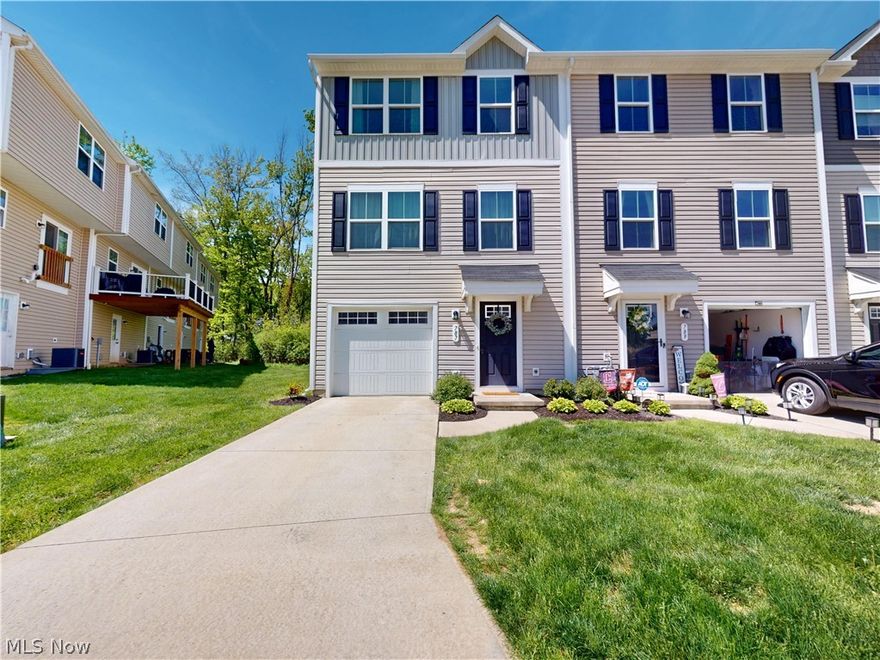 Welcome to maintenance-free living in this beautifully maintained end-unit condo, offering an incredibly low monthly fee of only $90 and the added benefit of being FHA and VA approved. Perfectly positioned for privacy, this home is flooded with natural light through its extra windows. The open-concept main floor features a modern kitchen with stainless steel appliances, a center island, and recessed lighting. Transition effortlessly from the spacious family room to your extra-large private deck, providing a perfect outdoor retreat with serene, wooded views.
The upper level is designed for convenience, hosting all three bedrooms and a dedicated laundry room. The owner’s suite serves as a private oasis with an ensuite full bath, while the additional bedrooms share a second full hallway bath. This prime end-unit location includes an attached 1-car garage and extra storage space. Combining modern amenities, a quiet wooded setting, and flexible financing options, this home is a rare find. Schedule your showing today!