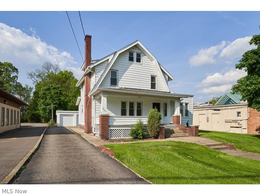 Commercially zoned Cuyahoga Falls home with detached garage and additional parking available. 1st floor space has great potential for offices in addition to the 4 bedrooms upstairs. No street signs permitted.