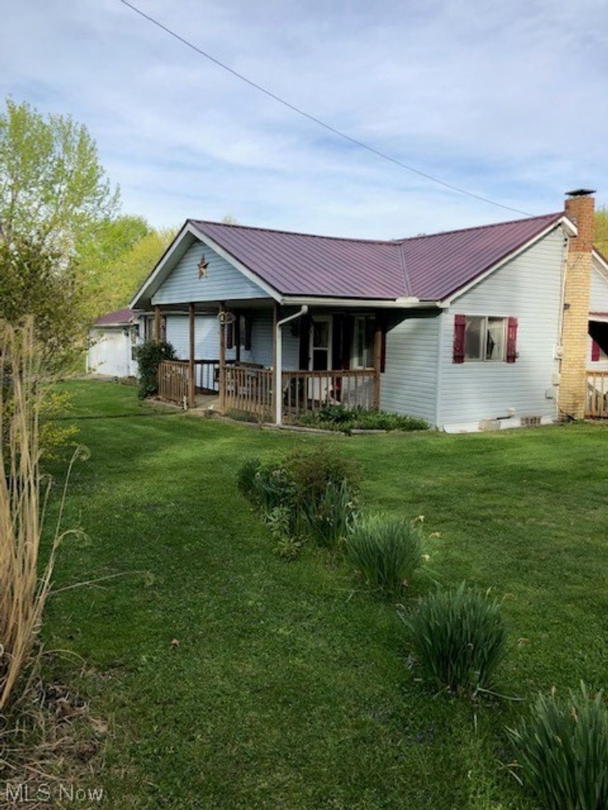 This 2 Bedroom home is situated on a very nice 3.63 acre lot. It has a newer metal roof, attached garage, a 30 x 40 pole barn, and is minutes from town. The home needs some work and is being sold "as is." You could also build and use the home as a rental.