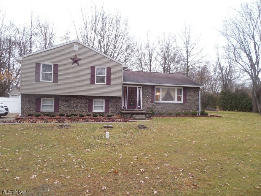 UPDATED four-level split in a picturesque country setting; beautiful woodwork throughout; hardwood floors in living room and 3 bedrooms; 6-panel doors; kitchen and living area have ceramic tile and granite counter; living room has lovely built-in cabinets and a wine cooler; backyard is great for entertaining with a large deck overlooking a 32 x 15 above-ground pool; siding 2008. roof 1999; almost an acre of land