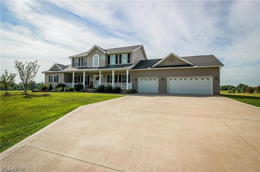 Great location for this impeccable home, nestled on 2.5 acres! Spacious first floor featuring a master suite with his and her closets, sinks, and Jacuzzi tub. Along with that this first floor has laundry, living room, formal dining, dinette, great room, sun room, 1/2 bath, and the kitchen with stainless steel appliances and granite counter tops. From the beautiful entrance to the foyer, just take in the display of the open staircase to the second level that has three bedrooms, a loft, and a full bath. Solid wood, granite, vinyl, and carpet floors throughout the home. There is also a family room with custom bar in lower level, along with a deck and a hot tub off the main level. Home generator, water softener, reverse osmosis, geothermal heat and A/C. Attached 3 car garage, plus for extra storage there is a 24x16 outbuilding with a porch. Close to Lake Mohawk and Atwood Lake. 30 minutes to Canton or New Philadelphia.