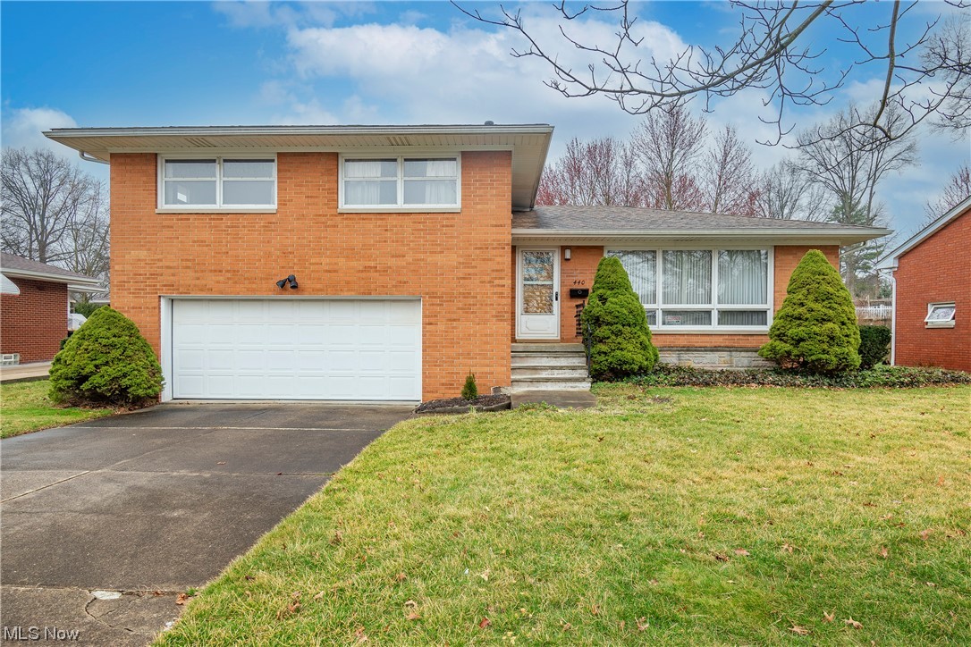 Welcome home to 440 Orrville Avenue! The potential is endless in this nearly 2,500 sq ft brick split level. Enter into the main living area boasting a living room and dining room with beautiful hardwood floors and a fully applianced kitchen. Venture upstairs to find two great sized bedrooms with large closets, a full bath, and an owner's suite w/ half bath. The lower level gives access to the attached two car garage and offers a family room and half bath. There is an additional finished living space, laundry room, and plenty of storage in the basement. Enjoy your morning coffee in the sunroom overlooking the oversized backyard w/ a patio and storage shed. Conveniently located near Route 8 and Front Street shops and restaurants. Notable updates include: washer/dryer, A/C 2023. Refrigerator 2022. Don't miss your opportunity to own this home. Schedule your private viewing today!