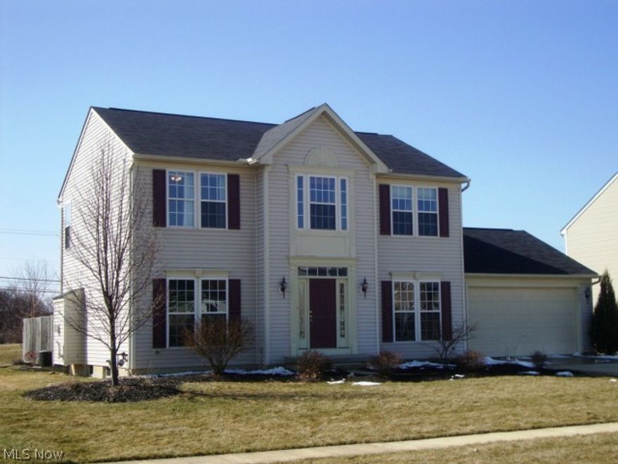 Light-n-bright spacious 4BR-4Bath colonial with many extras and desirable floor plan.  Family-sized kitchen with island and all appliances, beautiful morning room off the kitchen with expansive windows and vaulted ceiling.  Family room with gas fireplace, formal living and dining rooms; hardwood entry floor; finished basement with bar, gas fireplace, built-in game table and half-bath.  Freshly painted interior in now colors; 9-foot ceilings, crown molding in living and dining rooms; new carpet in 4 rooms.  Master suite is spacious with huge walk-in closet and large master bath.  Ample closet space throughout.  Rainbird in-ground sprinkler system, extra electrical outside, speaker wiring inside and out and invisible dog fence.  Entertain on an inviting stamped patio surrounded by a well-landscaped backyard with open space views. Family-friendly neighborhood with walking and biking trails.  Far enough away from the hustle-n-bustle but close enough to access major highways.