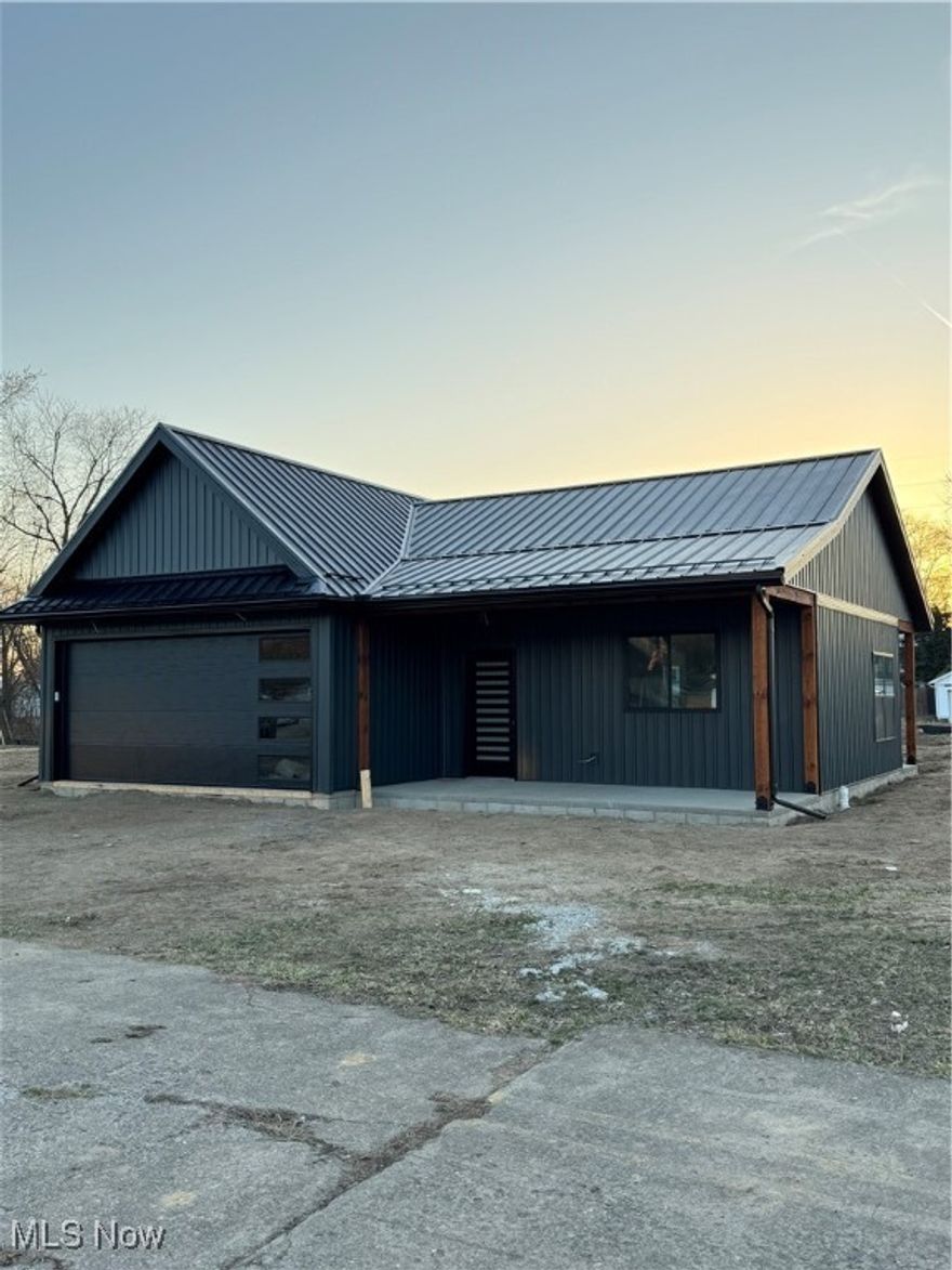 This 1,200+/- square foot, newly built, one floor plan home features an open-concept layout with three bedrooms and two bathrooms. The spacious master suite includes a private bathroom and a walk-in closet. The two additional bedrooms share a well-appointed bathroom. The design also includes a two-car attached garage for convenient parking and storage, plus two covered porches, one in the front and one in the back, offering great outdoor living space. The home blends modern comfort with functional design.