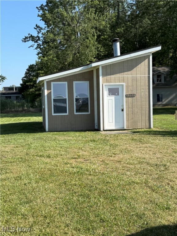 This is approximately a 432 Sq. Ft. little home. Just use your imagination. The inside is an open room and does not have any kitchen but does have a bathroom with a toilet and sink. The awesome thing about this little place is the beautiful view overlooking Lake Erie and your close to Geneva on the Lake. This would make a great little weekend getaway for your friends or family. You will enjoy spectacular sunsets with a wide open view. The state re-did the lake bank and when completed, they did install stairs down to the bottom.