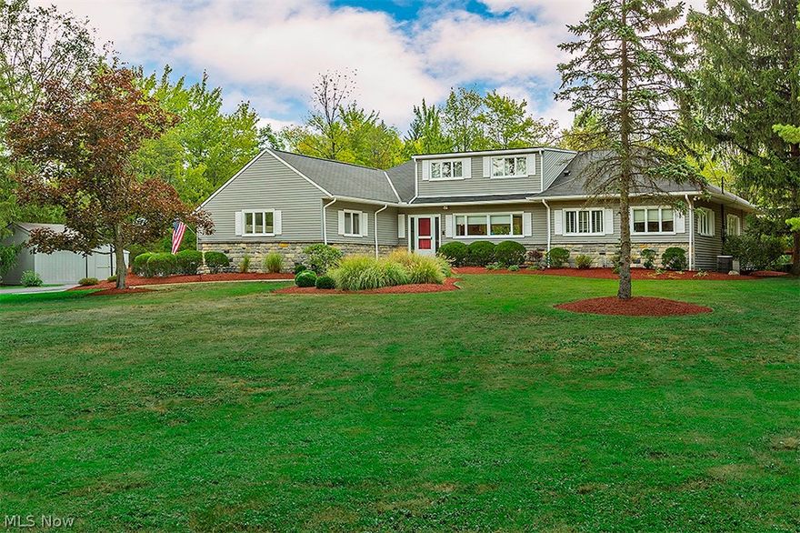 Outdoor Paradise! Very special private wooded setting makes this Moreland Hills gem irresistible! California style open floor plan is great for entertaining. Newly renovated stunning cook's kitchen w/stainless steel Viking appliances, Bamboo cabinetry & floors, granite counters and designer glass tile backsplash, opens to LR & DR. Walls of windows overlook fabulous grounds with great views of lush landscaping and in ground pool. Family Room w/wet bar opens to paver patio, pool & fabulous childrens rec. area. Huge 1st floor master suite w/large glamour bath & 2 walk in closets. 2 addt'l bedrooms on 1st currently being used as office & den. Versatile 2nd floor can be 2nd master suite or 2 BR w/full bath. This special home has been maintained to perfection and is truly one of a kind. Don't miss!