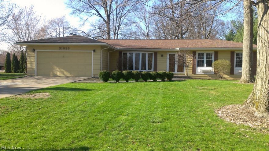 Wonderful ranch located in NE edge of Avon Lake close to lake. Loads of living space and a great flow and plenty of space for entertaining. Inviting family room with sliding doors leading to a fabulous sun room with walls of windows, soaring wood vaulted ceilings and a wood burner to warm and enjoy the space year round. From the sun room to an expansive deck leads to the new wood fenced back yard. Private deck off sliding doors from MBR, great spot for a hot tub, all plumbing and wiring in place. Huge finished rec room with a great entertainment area and cool bar. Private bath of MBR. Guest bath has 2 sinks and tile shower. Large kitchen with oak cabinets and stainless steel appliances including dishwasher, disposal, refrig and stove. Owners OK with pets with deposit. This one won't last.