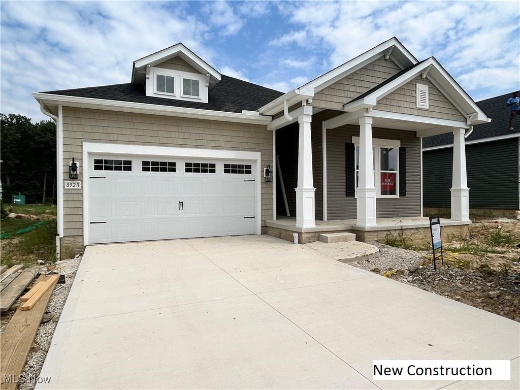 Available for move-in by late August, this exquisite interpretation of our sought-after Boise floorplan offers refined living in the prestigious Heritage Park community—where lawn care and snow removal are professionally managed for a worry-free lifestyle. This elegant ranch home features 3 spacious bedrooms, 2 lavish baths, and a private study with statement-making barn doors—all thoughtfully designed on a single level. A covered front porch and rear deck provide the perfect settings for serene outdoor relaxation. Step inside to soaring 10' ceilings, grand 8' doors, and expansive 6' windows that flood the home with natural light. Sophisticated trim details and tray ceilings add architectural depth in the foyer and primary suite, while a sleek gas fireplace brings warmth and ambiance to the great room. The designer kitchen is a showpiece, with rich, dark-stained cabinetry, Calacatta Abezzo quartz countertops, a full-height arabesque tile backsplash, under-cabinet lighting, and double wall ovens. The spa-inspired primary bath pampers with a freestanding soaking tub and custom-tiled shower. A well-appointed laundry room with window and utility sink adds practicality to luxury. Downstairs, the sprawling finished basement includes a guest bedroom, full bath, and an impressive 24' x 26' rec room. Every finish is hand-selected for timeless appeal—this is elevated living without the wait.