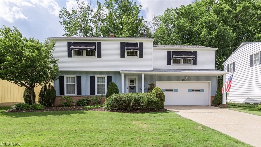 Wonderful colonial with many custom wood cabinets and shelves. Great care provided throughout this home.  This home offers a family room with fireplace and entry into a bright large open Sunroom with beautiful built in cabinets and entry to patio area. The living room and dining room are open to each other and allow for great entertaining space as well.  The kitchen includes all appliances; built in range top, double ovens, dishwasher (new 6/2017), refrigerator and microwave.  The washer and dryer are also included.  The master bedroom is huge with a walk in closet and master bath.  All bedrooms and hallway upstairs have wood floors underneath carpet.  The one bedroom is currently used as an office with wonderful built ins and has a huge walk -up insulated attic.  The finished basement is another area for entertaining as well as the utility area for storage.   So much space and storage in this home.  Make this home that has been given great care and pride your own.