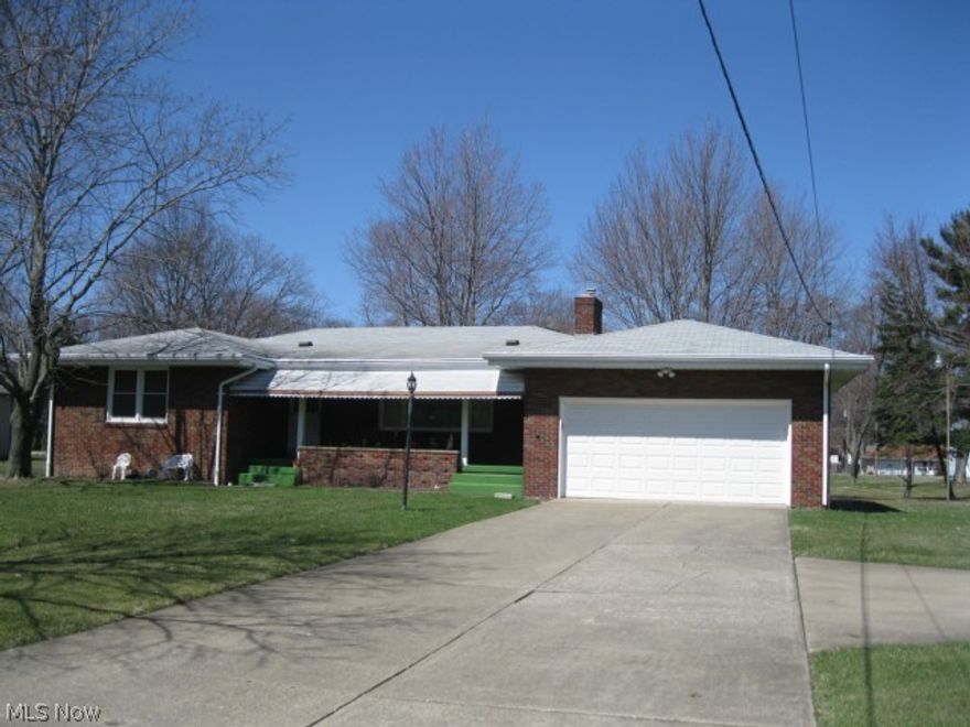 Here's Your home! All Brick Ranch with a nice, 125 ft wide & 200' deep yard! Spring and summer are coming(We promise!) and you'll love this big back yard for fun & entertaining!  __Brand New Kitchen!__  New Cabinets, counters, sinks, Appliances, Flooring. New Tilt-In Windows. Bathrooms updated. Updated electric. Quality Built with Coved ceiling and Fireplace in Living room. Hardwood floors in bedrooms and Under ALL Carpets! Rec room in basement. Eventually, when it gets hot(sounds so far away!) You'll be happy to have the covered porch, too! _Home Inspection performed in 2013 by a local Home Inspector!!Yay!Good to go! Septic just tested & passed last year!_ Driveway extra parking/turn. Home Warranty. Just minutes from the Racino that's opening this Fall! Close to Pharmacies, Immediate care, Grocery, Pharmacy and Big Shopping Stores! Home Warranty included.