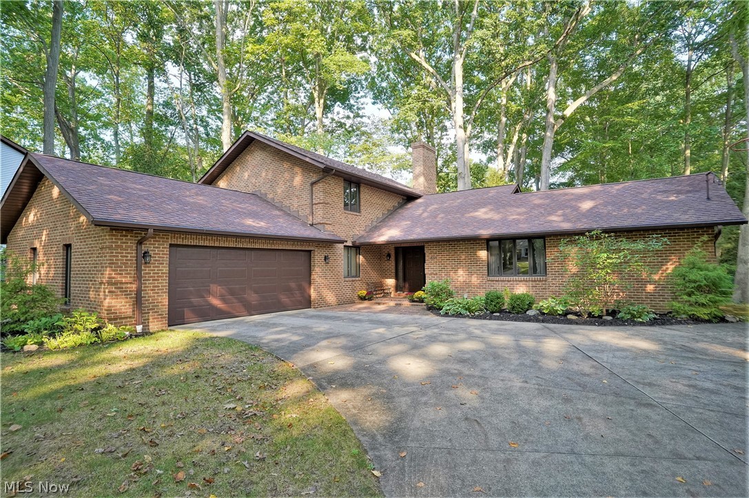 All brick custom brick home in Silver Lake Village offers spacious rooms and an open floor plan! Enter the large foyer, which leads you to the fireplaced living room, dining room and huge eat in kitchen complete with breakfast bar, corner desk area (perfect for a phone charging station), plenty of cabinet and counter space and pantry. There's even access to a second patio off the kitchen. The fireplaced family room with siders to the nice patio is so peaceful. Rarely available first floor laundry, office (could be a 4th bedroom) and full bath complete the first floor. The second floor offers spacious bedrooms with nice closet space, another full bath and the primary bedroom includes a walk in closet and full bath. The lower level could easily be finished as it has high ceilings and separate areas allowing for many options/storage and there is rough in for shower, toilet and sink. Oversized 2 car garage. Hot water tank - 2020 and roof approximately 12 years young. Home warrant