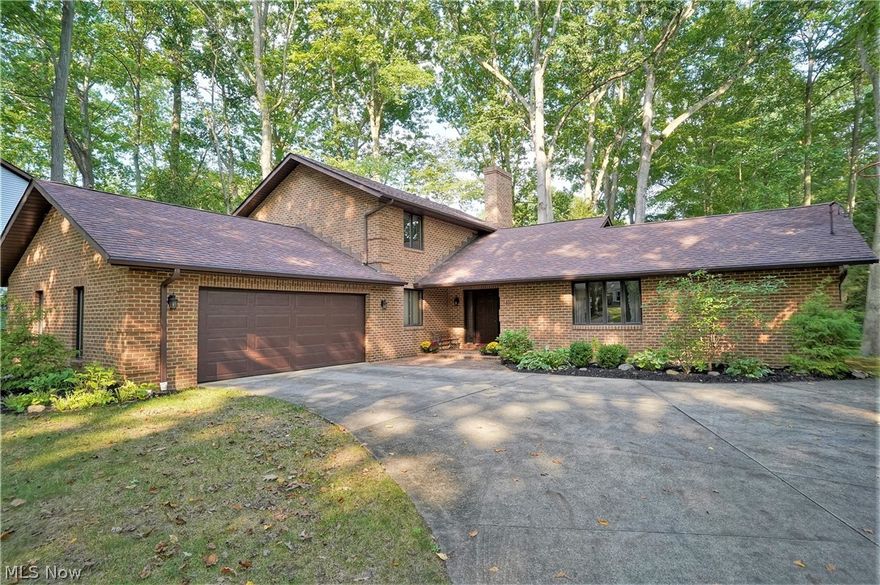 All brick custom brick home in Silver Lake Village offers spacious rooms and an open floor plan!  Enter the large foyer, which leads you to the fireplaced living room, dining room and huge eat in kitchen complete with breakfast bar, corner desk area (perfect for a phone charging station), plenty of cabinet and counter space and pantry.  There's even access to a second patio off the kitchen.  The fireplaced family room with siders to the nice patio is so peaceful.  Rarely available first floor laundry, office (could be a 4th bedroom) and full bath complete the first floor.  The second floor offers spacious bedrooms with nice closet space, another full bath and the primary bedroom includes a walk in closet and full bath.  The lower level could easily be finished as it has high ceilings and separate areas allowing for many options/storage and there is rough in for shower, toilet and sink.  Oversized 2 car garage.   Hot water tank - 2020 and roof approximately 12 years young.  Home warrant