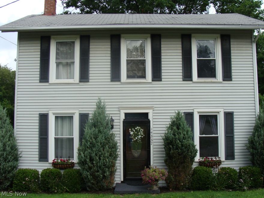 This is a 3 - 4 bedroom Century home with 1 1/2 baths & completely renovated and enlarged kitchen. It has  new flooring, lighting, cabinets, counters, sink & faucet. KIT Appliances staying. First floor laundry. The 1st floor bath has also been remodeled.The large deck off the back is just wonderful!