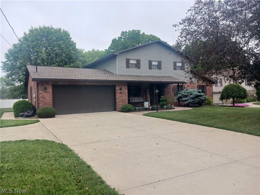 You will want for nothing in this beautiful two-story brick home in Devola. Meticulously maintained and tastefully updated, offering four large bedrooms and three gorgeous baths, professionally remodeled. Tons of kitchen space with pull out storage. New 6 panel oak doors and trim. First floor full bath and bedroom. New 3 dimensional shingled roof as well as gutters, soffits and fascia in 2017 on home and outbuildings. Convenient flat lot with mature landscaping and back privacy fence. Enjoy your backyard while sitting on your 12x20 screened in patio. Well thought out concrete stamped walkways and large turn around or parking pad surround the home. Enjoy the convenience of a two car attached garage that walks into perfectly planned laundry layout. Full basement with tons of storage and extra 14x12 room for office or bedroom space. Outside, the extra garage space in the backyard or Hobby shop offers you a 24x12 large building and a heated 16x12 smaller building.  This outside space is offered to you with inside space of over 2200 of main living and 1,000 sq ft of basement for your needs. This home is turn-key, it has it all. Schedule your appointment soon or you may not get the chance.