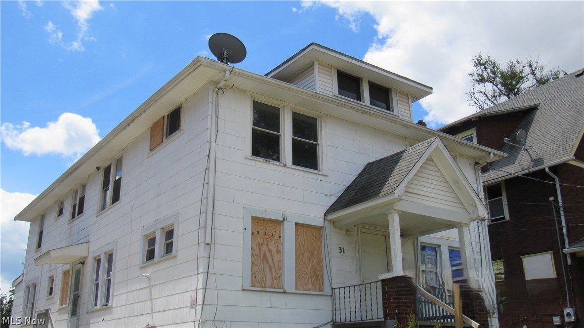 View of front of property with entry steps. First Floor - Unit #1 on Left and Unit # on Right. Unit #3 Second Floor - Upper Left and Unit #4 Upper Right