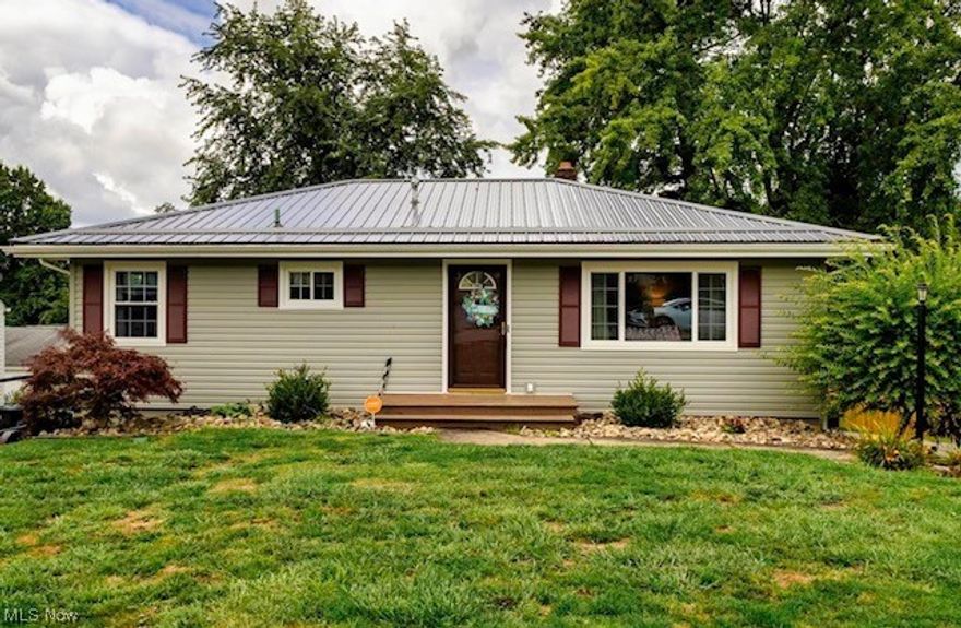 Welcome to this stunning move-in ready home in a desirable location! With a new metal roof, windows, and siding all installed in 2020, this property offers a modern and well-maintained exterior. The two-car garage, spacious driveway, and flat backyard provide ample space for your convenience. Enjoy the beauty of the covered back porch and the warmth of the beautiful hardwood floors throughout. The finished rec room in the basement, complete with a half bath, adds extra space for entertainment or relaxation. Don't miss the opportunity to own this gem in a sought-after area!