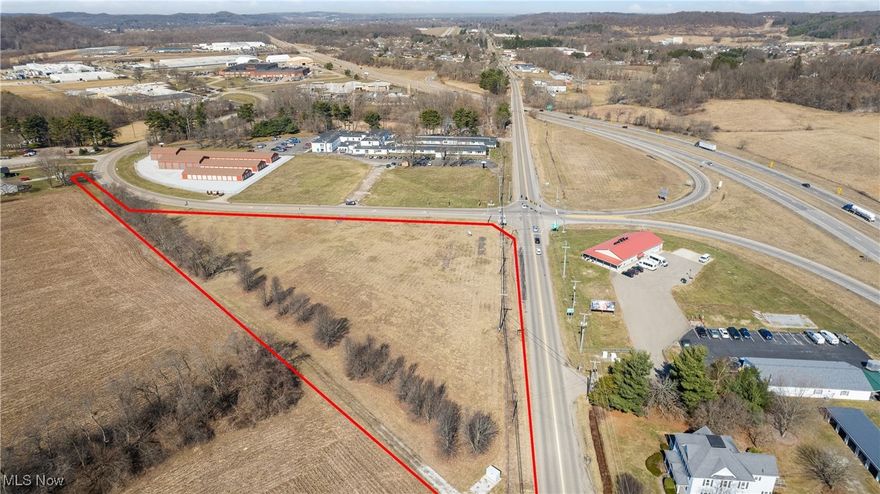 Don’t miss this exceptional development opportunity just off State Route 250 near a growing industrial park. This 3.7-acre vacant commercial parcel offers 1,000 feet of frontage on two roads with three potential entrances, providing unmatched visibility and accessibility.  The land is flat, cleared, and development-ready with public utilities available (water, sewer, and electric). Its size, layout, and location make it ideal for a wide range of uses—office, self-storage, retail, restaurant, gas station, hospitality, medical facilities, apartment complex, or a senior living community.  Positioned along East High Avenue with an average daily traffic count of approximately 5,400 vehicles, this site ensures strong exposure in a high-traffic corridor with excellent growth potential. This is a rare chance to secure a versatile, easily accessible property in one of the area’s most strategic locations.