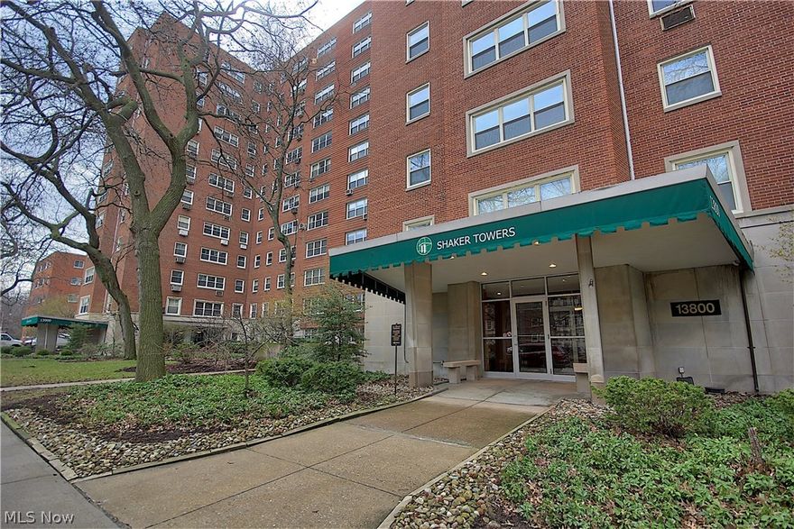 Located in Shaker Towers in Historic Shaker Square, with easy access to restaurants and shops and RTA Rapid Transit to downtown CLE and all points! Nicely situated in building with lovely views of the rooftop garden! Charming breakfast room with built-in cupboards! Formal Living and Formal Dining Room, ideal for entertaining! Both LR/DR have hardwood floors with inlay so rugs are negotiable! Delightful kitchen with great counter space, in suite laundry and two additional full baths. This unit is light and bright and really shows well! Excellent price for building. 24 hr garage attendant, secure building and ample storage!