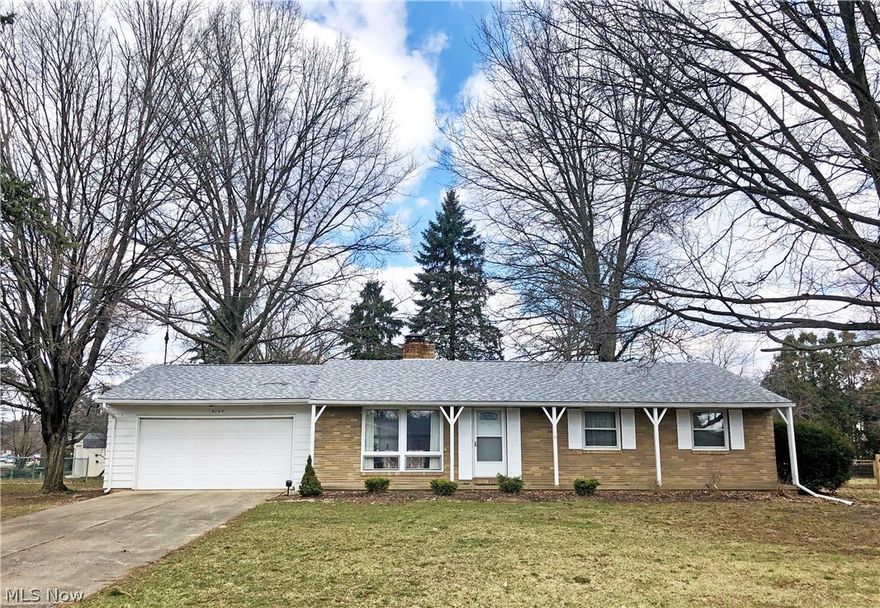 Incredible move-in ready ranch includes a large open great room with wood burning fireplace and vaulted ceilings that opens to the dining room, both with newly refinished hardwood floors. Kitchen with updated cabinetry, newer flooring, countertop range, and breakfast bar. Spacious master bedroom with dual closets and en suite bath. Both full baths have been completely remodeled with new flooring, vanities, and showers. New carpet and generous closet space in all bedrooms. This home features a sizable basement that could be easily finished, already including a bonus room/office, as well as a large 2-car garage. All this plus a gorgeous open backyard with mature trees, great for entertaining - don't miss this one!
