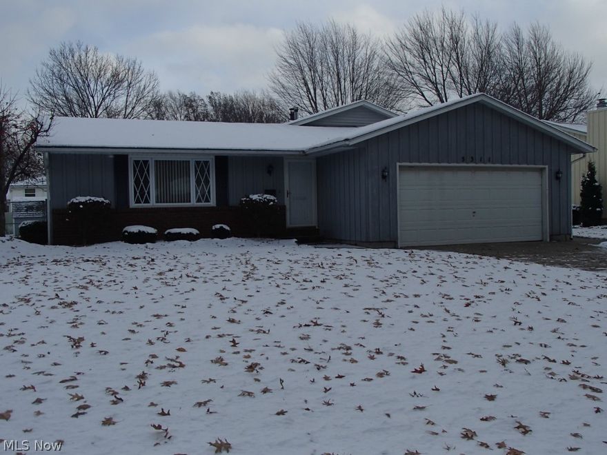 Welcome to 5311 Gargasz.  Amherst City Schools.  Close to shopping and major highways.  Spacious split-level with tons of storage.  Enjoy the winter with an amazing stone gas fireplace that's sure to keep you and your family warm.  Fully fenced back yard with Jacuzzi hot tub.  This is a Must See, and priced to sell.