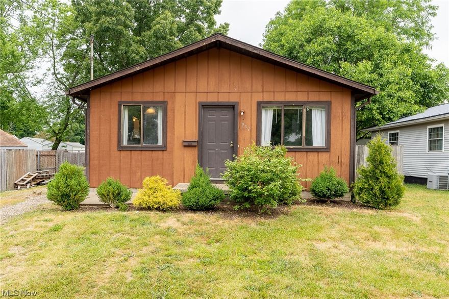 Check out this adorable, move-in ready 3 bedroom / 1 bath home near Portage Lakes!  Step inside this newly installed front door (2023) and be amazed but the cozy, home-like feel.  Large great room with natural light, fresh neutral paint and carpet flows right into the oversized eat-in kitchen with designated dinette area. Kitchen updates include new LVT floors, cabinet refacing, and back splash. Three generously sized bedrooms with ample closet space and a newly renovated bathroom (2022) with fresh vanity and shower/tub combo finish off the main level.  The basement is bright and dry and ready for your finishing touches.  Unfinished portion is 22x28 and partially finished separated area is 12x22.  Outside is a fully fenced in backyard with large, new shed and plenty of space for entertaining. Brick pavers outside of side door were planned for a patio space and are negotiable. New roof in 2020!