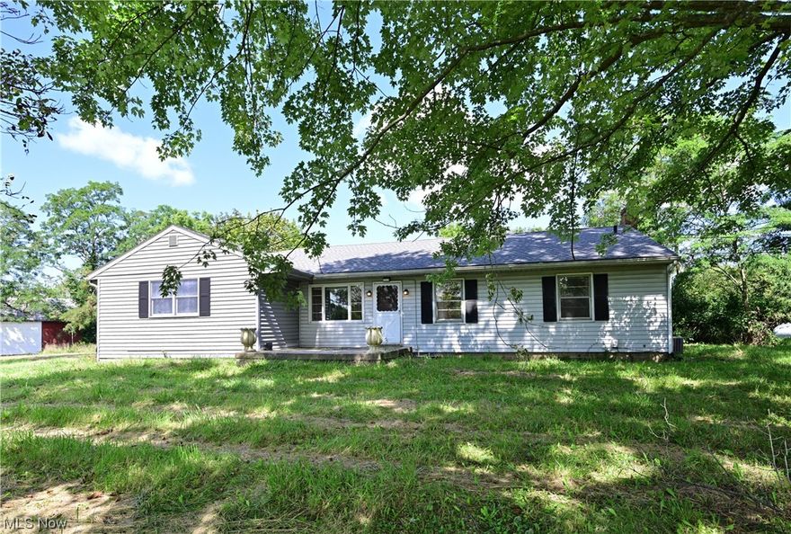 This one of a kind property, used to be called Bocce Ball Lake! The charming country ranch house (1,813 Sqft) has 3 bedroom and 2 full baths. It is located on 29.2963 acres filled with wood lands, fields with deer and turkey and 5.5 acre lake. Lake/Pond is spring fed and run off, filled with Small Mouth Bass and Bluegill. 10 acres are part of the CAUV tax reduction program and can be expanded if desired. Enjoy the views of the stocked lake with a dock and slide.  The Great room has a wood burning fireplace and an atrium window with a wonderful view of the lake. Spacious dining room that leads into the kitchen. Kitchen features plenty of oak cabinets, a lot of counter space and two pantry's. There are 3 nicely sized bedrooms which were freshly painted and two have hardwood floors. There are two nicely renovated full baths. There is plenty of storage. The large full basement is 1,053 SQft, has newly painted floors and glass block windows. There is a nice wood deck and patio in the back. Barn has upper and lower storage, with a loft and electric, options for live stock. (lower level could be an excellent wine cellar.) HVAC 2020, Roof 2017, Hot water tank 2020. Water system-Well & Cistern with holding tank & three phase water filtration system (2022)