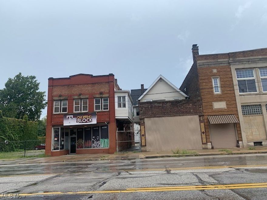 4continguous buildings in St. Clair-Superior neighborhood along St. Clair Ave across from the City Recreation Center.  The main building at 6225 St. Clair has an overhead door, in the rear and heavy floor loads and power. It was used to manufacture cars at one time per the owner. It has a second floor with small lift cranes to bring items to the second floor which has concrete floors.
6221 St. Clair Ave. has 2 apartment units.  There is a small brick storage building to the rear of 6221 St. Clair.
6217 St. Clair Ave has a former restaurant space with equipment and coolers.  There are apartments above and to the rear of the former restaurant.
Parking can be accessed to the rear off of East. 63rd Street via a gated fence which provides parking for all the spaces.
The total land area is approximatley 29,910 sq. ft. and has some 134 feet of frontage along St. Clair Ave. and L's around the corner building on St. Clair and E 63rd St.