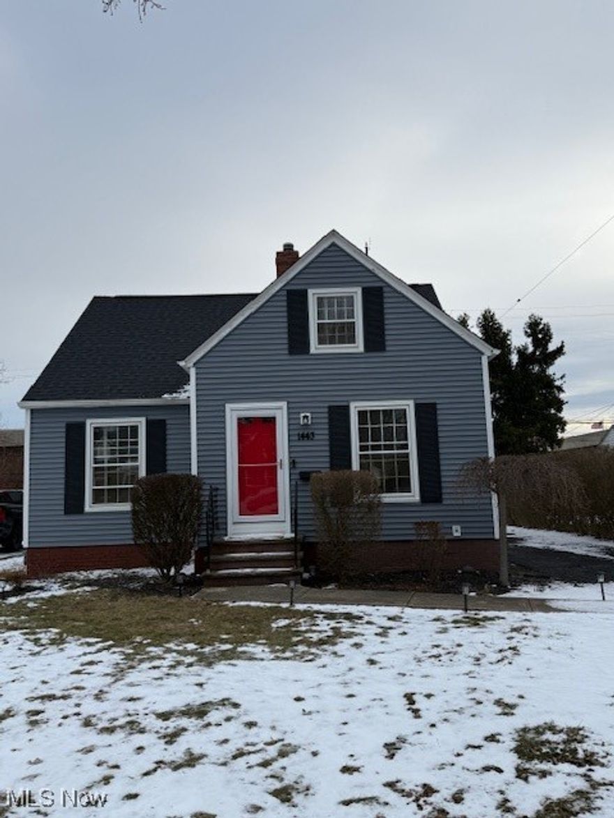 Step into timeless elegance with this beautifully updated Cape Cod residence, ideally situated in the highly sought-after city of Lyndhurst. Thoughtfully curated updates include a new roof and doors installed in Fall 2023, as well as brand-new siding completed in December 2025, ensuring both style and peace of mind. The welcoming foyer opens into an inviting living room adorned with rich hardwood floors and a classic fireplace, creating an atmosphere of warmth and sophistication. The gourmet kitchen is designed to impress, featuring sleek countertops, stainless steel appliances, custom cabinetry, and a stylish breakfast bar—perfect for both intimate meals and elegant entertaining. The main level offers two well-appointed bedrooms, one providing seamless access to a sun-drenched sunroom—an idyllic retreat for morning coffee, quiet reading, or year-round relaxation. A beautifully finished full bathroom with a tiled tub surround completes the first floor. Upstairs, the expansive primary suite serves as a private sanctuary, complete with direct access to a tastefully updated full bathroom showcasing a double-sink vanity and contemporary fixtures. The pristine, unfinished basement offers endless possibilities, whether envisioned as a home gym, private office, or refined storage space. Perfectly positioned near lush parks, top-rated schools, upscale shopping, and fine dining, this exceptional home also provides effortless access to major highways and public transportation—offering the ultimate blend of luxury, comfort, and convenience.