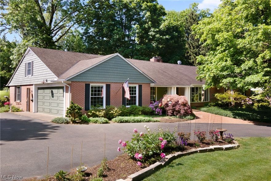 Exquisitely executed details, quality, & charm abound in this Avondale brick Ranch.  Mid-century modern vibe w/ details you'd expect from an Avondale beauty. Gorgeous setting w/ majestic trees, manicured gardens & fully fenced backyard. Stunning Foyer, LR w/grand bay floor-to-ceiling windows & fireplace, Formal DR, Den w/fireplace,  walls of bookcases all graced w/ gorgeous hardwood flooring. 2 Owners suites w/ private baths, tons of closet space, & Junior suite area too. Impressive eat-in Kitchen w/island, coffee bar & more. Delightful 4 season Sunroom offers changing views throughout the year of the many established varieties of perennials.  Outdoor entertaining abounds in the expansive patio w/heated floor. 1st floor Laundry/Mudroom just off the oversized side-entry garage. Lower level Rec Room, bonus room/4th BR, 1/2 bath. One-of-a-kind attention to detail you can't miss. 1 yr home warranty included!