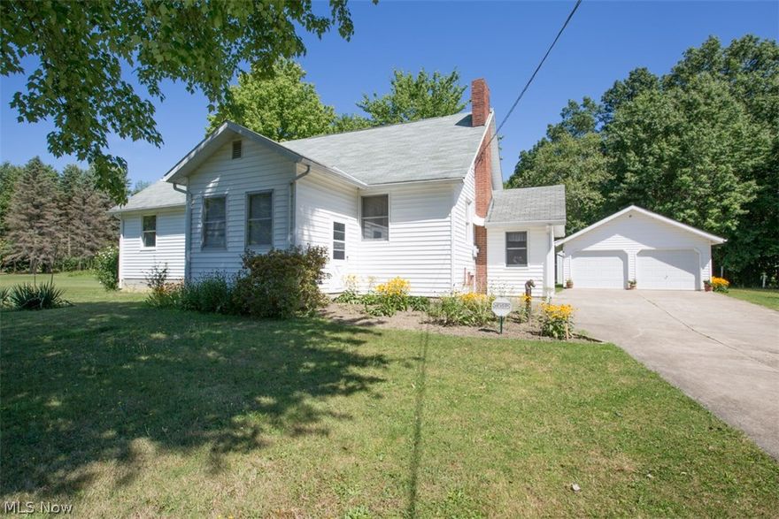 Absolutely Phenomenal 4 Bedroom/3 Full Bath home with 2 Car Attached, 2 Car Detached, Mini Barn, & Fenced in Pasture on over 4 Acres of Private, Wooded, Scenic Backyard.  Home Features Include:  First Floor:   Large Updated Kitchen with New Cabinets, New Ceramic Tile Flooring,& Newer Countertops, Large Front Living Room, HUGE Formal Dining Room Addition, Spacious Master Bedroom/Master Bathroom Addition, 2 other Large Bedrooms, & 2 other Bathrooms. Second Floor:  MASSIVE Bedroom with Awesome Walk in Closet.  Home is very well updated & cared for.  Updates Include:  Updated Electric, Newer Central Air, Newer Vinyl Siding, Newer Andersen Windows, Newer Flooring, Updated Kitchen, Updated Baths, & a Fresh Coat of Paint.