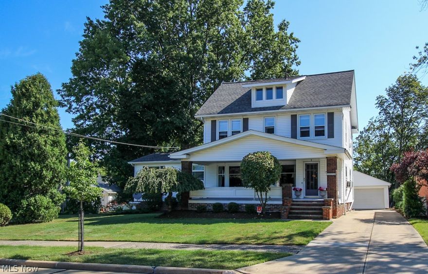 Bursting with historical charm and modern features, this home blends the best of old and new! Some features include a large front porch, a huge vaulted great room open to the kitchen, first floor laundry and full bath, partially finished basement, original built-ins/ hardwood floors/ trim/ doors, an expansive deck and yard, all wrapped up into this spacious, well maintained century home! Upon arrival you are greeted with a large front porch and original front door! Inside you will notice the large dining room complete with built-ins and a working wood burning fireplace. Off the dining room is the ‘bar room’ with more original built-ins and a large picture window overlooking the front yard. The large eat-in kitchen where all appliance will stay, features a sizable island, a slider out to the deck and is open to great room! The great room offers leaded glass transom accents, a working gas fireplace with a vintage mantle, vaulted ceilings and a slider to the deck. Also not to be missed on