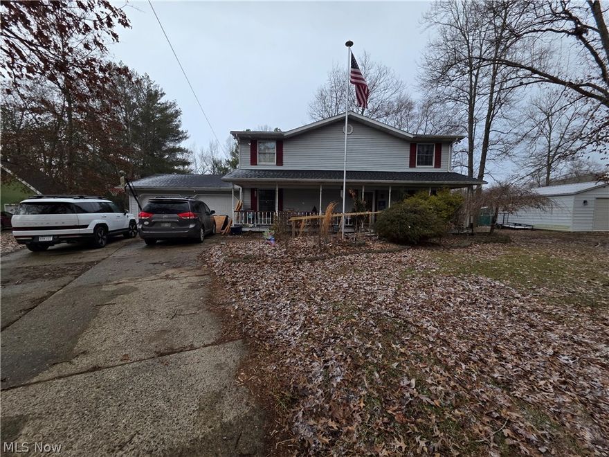 2 Story home with Attached and detached garage.  Bring your tool kit and elbow grease and make this into the beauty it is meant to be.  Seller is asking to sell as is where is.