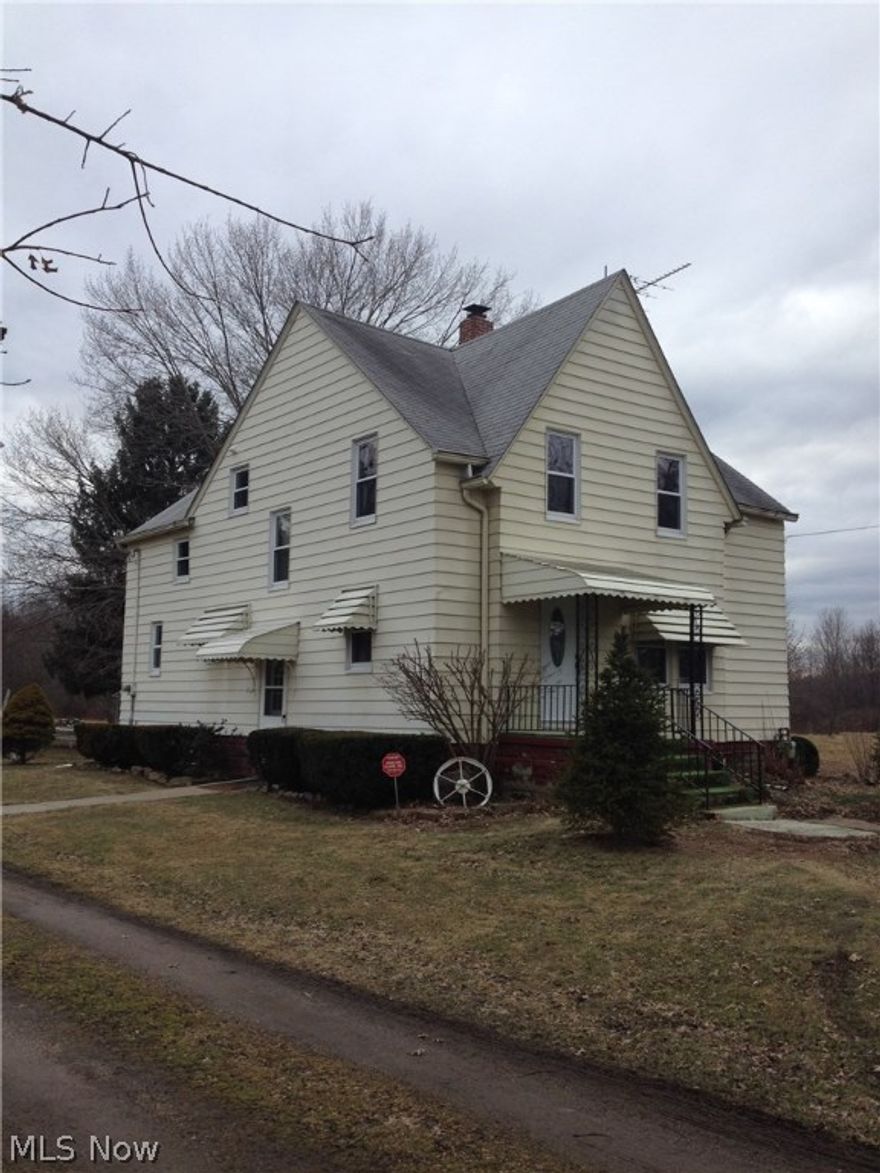 Refinished 1900 sq. ft. farm house featuring 5 bedrooms (one on the 1st floor, 4 upstairs), 2 full baths with all new fixtures. Bath on 1st floor has stackable washer/dryer area. Kitchen with all new appliances. Original hardwood flooring in all rooms on first floor. All new carpeting upstairs. Newer vinyl windows, security system, reverse osmosis system. 10 acres with over 300' frontage, apple orchard, stand of young walnut trees, circular drive and 24 x 24 detached 2 car garage.