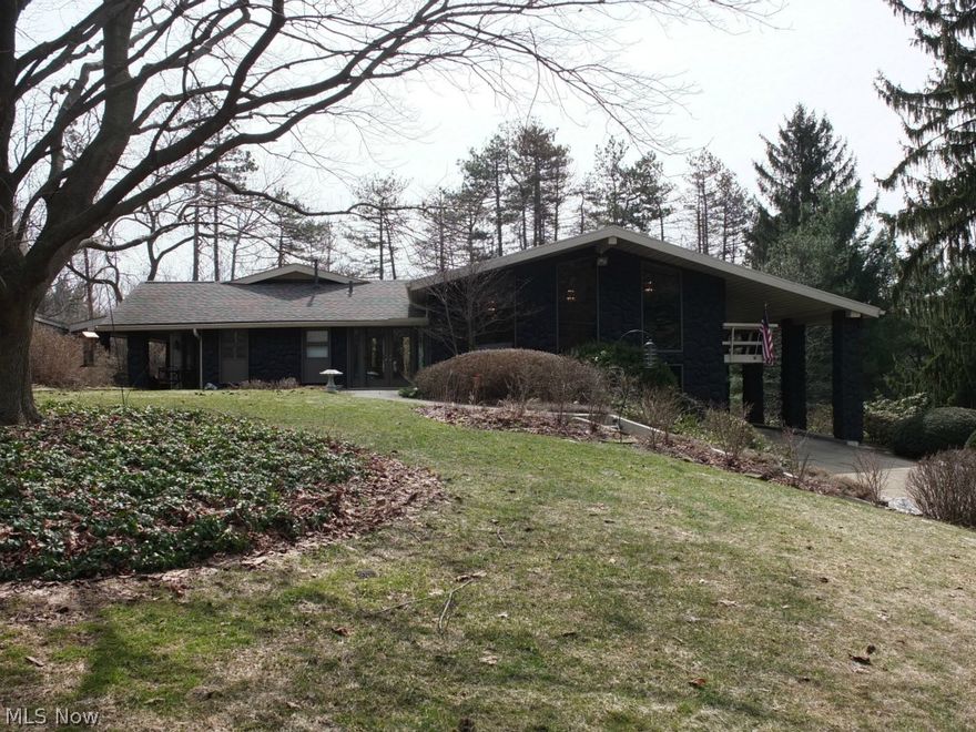 Not your typical home! This exquisite 4-5 bedroom, 3.5 bath home with 4 car garage sits on a very private 1.6 acres! You will be impressed with the space, character and amenities this one of a kind home has to offer. This multilevel home features a stunning remodeled kitchen with stainless steel appliances, double oven, granite countertops, Hickory cabinets, hardwood floors and ceramic tile backsplash... simply beautiful!! Wonderful living spaces including great room with fireplace and lower level rec room with fireplace and bar. Tons of open space between the kitchen, formal dining room and dinette...fantastic for entertaining! Master bedroom with vaulted ceilings, built in dresser and two large walk in closets! Master bath has soaking tub with attached TV. Bedroom 2 has 3 closets including two walk in closets! Bedrooms 3, 4 and 5 all have ample closet space, vaulted ceilings and split bedroom design. Main floor laundry! The setting of this house is second to none…very private, stunni