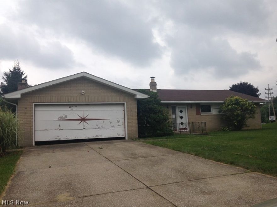 Solid brick home, covered patio, replacement windows, 1st floor family room, Needs rehabbed, but great resale potential.