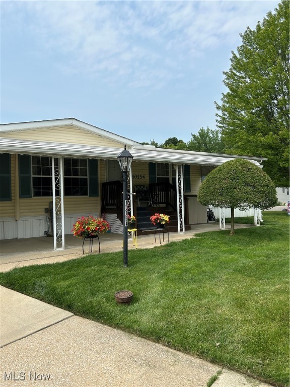 Well-kept 1991 Skyline Double wide, Woodbridge Model in Camelot Village. Extra wide concrete driveway, space for 3-4 cars depending on size. 45-foot awning covering large patio area. Well-kept home on nicely landscaped corner lot. Roof replaced in 2021, all carpet and vinyl flooring replaced in 2006. All plumbing was replaced in 2000 due to a re-call. Vinyl windows are tilt-in, easy to clean. Easy access to I480, I-80, shopping, restaurants, medical facilities, golf and health club. Come take a look at your new home. Great for starting out or downsizing. Buyers need to be approved by the park. Monthly lot rent is $610