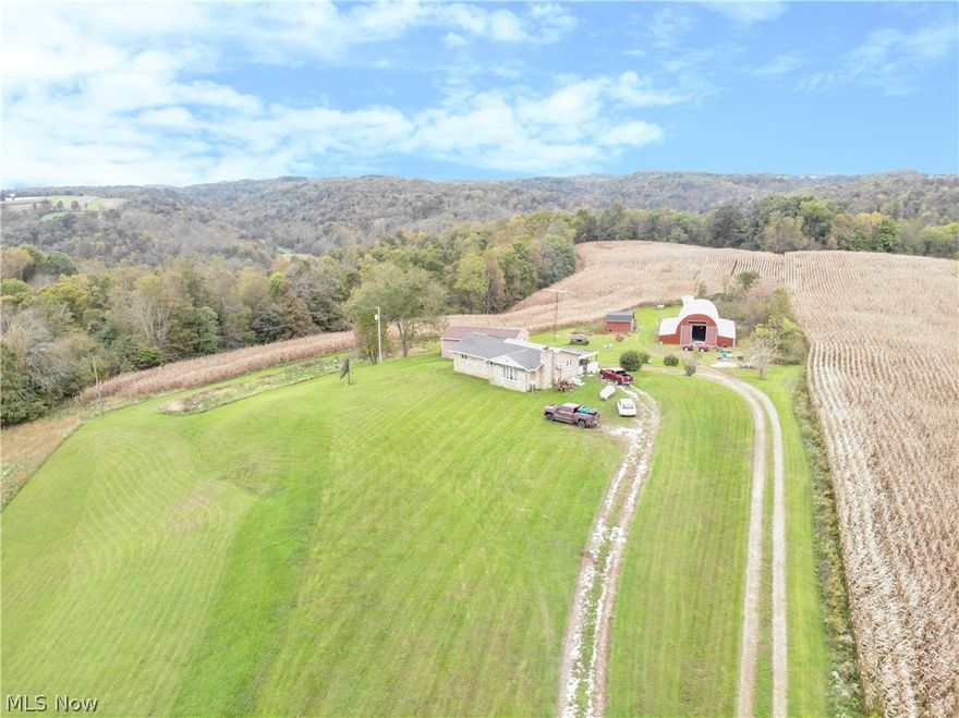 Auction 11/21: 130 acres offered in 5 parcels featuring a brick ranch home, detached garage, barn, ponds, hunting blinds, tree stands, mineral rights, and much more. This home, built in 1975, features an open floor plan with kitchen, living room w/fireplace, 2 bedrooms, and full bath with laundry area on the main floor. The full walkout basement features large family room area w/ brick fireplace, bedroom, and full bath. The home has a new roof and utilities are propane gas heat, spring water & septic. Additional improvements include a 40’x44’ garage with electric and a hoop style barn and chicken coop. The land offers parcels ranging in size 14 to 54 acres with a very good balance of open tillable hay fields and wooded land and includes 2 ponds. There is plenty of road frontage with over 3,400’. The mineral rights will sell with the land and are all intact. There is a 50% royalty interest in all gas/oil rights. This is a rare offering of a farm in this location with the mineral rights.