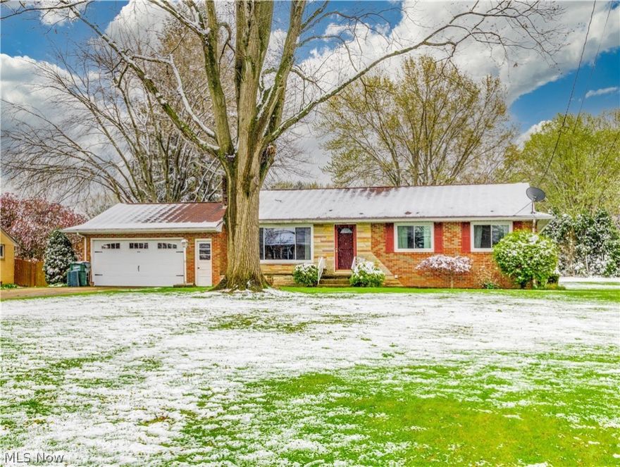 Imagine starting your mornings in the sun-soaked living room and when the Ohio weather decides to snow in the spring cozying up to the fireplace. There is an eat-in kitchen with updated flooring (2020) that opens to a spacious backyard from the sliding glass door. On the main floor, you will find 3 bedrooms with wood flooring and a full bathroom. The basement is partially finished with plenty of space for storage or a bonus room. The basement living room offers a second fireplace as well as a second full bathroom.