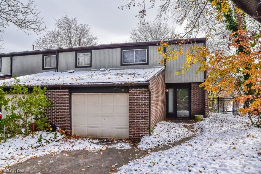 Tons of potential in this 3 bedroom, 1.5 bath condo with open living areas! Incredible views of the canal from your private back deck as well as through the 2 sets of sliding glass doors in the living room. The living room boasts a fireplace and opens to the dining room. Crack open your cookbook in the fully applianced kitchen with a breakfast bar and tile flooring. Convenient half bath on the main level, too. Upstairs, the master bedroom has a walk-in closet. There are 2 additional bedrooms and a full bath with a skylight. Full basement for storage plus a 1-car attached garage. Come see all this home has to offer!