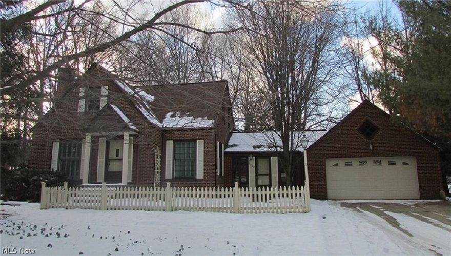 Charming Brick 3 Bedroom 1.5 Bath Brick Cape/Bungalow on 100 x 209 Beautifully Treed Lot. Cherry Kitchen w/All Appliances & New Hardwood Floor, Family Room has New Carpet and French Door to the Vaulted Sunroom w/Skylights, The Living/Dining Room Combination boosts Beautiful Hardwood Floors, Shutters, &  Wood Burning Fireplace, All Bedrooms have Hardwood Floors, The 1st Floor Bedroom has built in Cabinets, The 2nd Floor Bedrooms have Ceiling Fans plus an Updated Bath, The 2nd Floor also has an extra Closet, plus a Walk in Floored Attic, Roof approx. 2015, Updated Electrical Panel, Furnace Rebuilt 2016 w/Newer Ductwork & Chimney Flue, &  Basement w/Glass Block Windows, Many Rooms Freshly Painted, the private yard has a shed for those extra items, & 2016 Stamped Concrete Walkway to the home. This home is conveniently located to I-77 & 480, Move in Condition, Awaiting a New Family