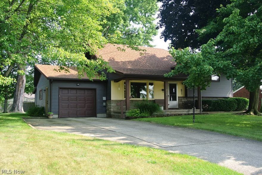 Wonderful opportunity to buy this 3 bedroom 2 full bathroom home.   This charming split level features a living room, dining room, eat-in kitchen and family room with fireplace.  Hardwood floors in all rooms except kitchen and bathrooms.   Inviting front porch, spacious back yard, outdoor storage room/shed and attached garage.  Beautiful street and great location.  Please call today to schedule your appointment.