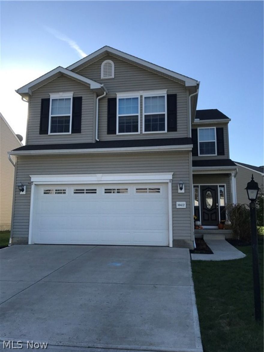 Don't miss this 5 year young lovely and well cared for 4 bedroom 2.5 bath home with finished basement. It is a dream come true in AURORA Schools for the price. The first floor is made up of a huge family room, The corner fireplace makes it cozy and warm.  The kitchen has upgraded cabinets, stainless steel appliances, including refrigerator, and an nice dining area with a sliding door leading out to the paver patio.  Upstairs there are 4 spacious bedrooms and a sought after second floor laundry room with front loading washer and dryer that stays with the house.  The master has a large walk in closet AND another large wall closet.  There is also a master bath. The lower level is partially and nicely finished but still has lots of storage. One section of the room has carpet and another area has laminate.  It could be an office area or play area.  The 2 car attached garage has a floor that has been sealed and painted and has both hot and cold water available.  This home has been lovingly c