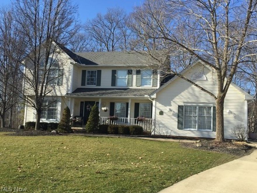 Beautiful Colonial in a rare boating community on private lake for residents! Lake is shared with community of the opposite shore. Docks are available for rent. Waterski! Swim! Boat! Clubhouse pavilion, pool, sand volleyball, bocce courts, playground, tennis courts and more! Mature trees and landscaping. Served by highly-ranked Aurora City Schools just 3 miles away.  Open floor plan home w/granite and SS kitchen, great for entertaining and family get-togethers. Finished basement w/professional home theater and abundance of shelf storage.  Popcorn, anyone? This is a GEM!