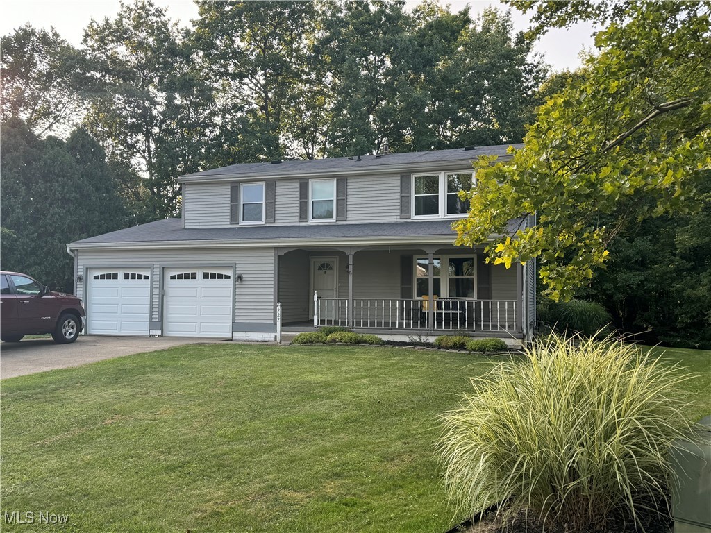 Colonial situated in the middle of a quiet cul-de-sac, in the heart of Medina, OH. This home offers 4 bedroom and 2.5 baths. The inviting living room opens to the formal dining room and on to the kitchen. The kitchen is equipped with stainless steel appliances, granite countertops, and opens to the kitchenette and large family room. There are beautiful hardwood floors throughout the first floor creating a wonderful flow. Large sliding glass door off the kitchen open to a large deck overlooking the private, wooded backyard. Upstairs there are 3 large bedrooms with an updated bathroom. The master bedroom offers a walk-in closet, a full bath, and a vanity area. The basement features an updated entertainment room, laundry and large storage area. This house features many updates, just waiting for you to make this house a home.