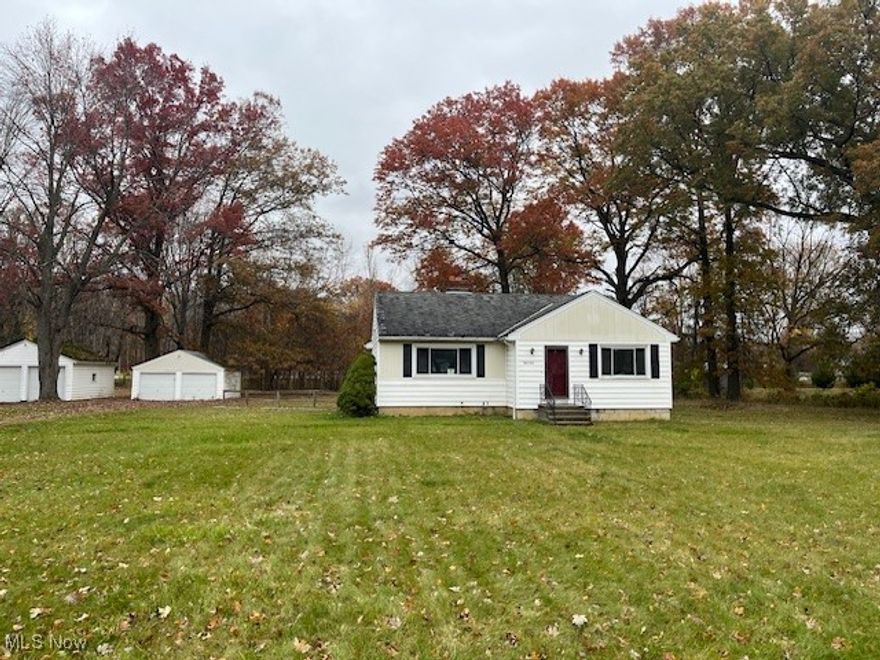 Looking for a huge lot with country feel in the city? Look no further. Ranch home needing some work but with
terrific potential. Hard wood floors in all bedrooms. Large living room and double door closets. Dining room is a decent
size with carpeting. Kitchen has older charm but could use a refreshing. 2 car garage with plenty of room on a HUGE lot. 4
parcels totaling over and acre. Bring your ideas and make this home a shining showplace once more.