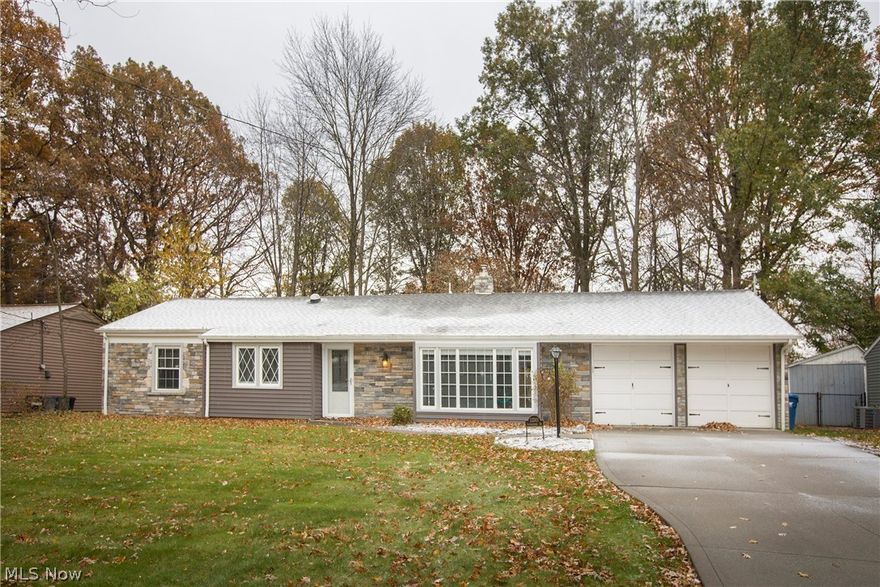 Prepare to be Moved!...Special Financing Available...Into this elegant Bay Village ranch in a quiet neighborhood just minutes from Lake Erie! Tastefully updated inside and out, plus many stylish & high-end neutral finishes. Stepping into the foyer with beautiful ceramic tile flooring, you'll love the open floor plan perfect for entertaining family and friends. Large living room with oversized window flows into the dining room with sliding glass doors out to the patio. You'll love cooking in the updated kitchen with granite countertops, custom tile backsplash with glass inserts and tons of storage in the dark wood cabinets and soft closing drawers. In addition, enjoy the large pantry and stainless steel appliances, which all stay! Master bedroom with oversized closet and gorgeous in-suite bath with walk-in tiled shower. 2 additional bedrooms with neutral carpet and colors share a 2nd full bath. Dream-sized laundry room and mud room off the attached 2-car garage. Enjoy BBQ's on the back